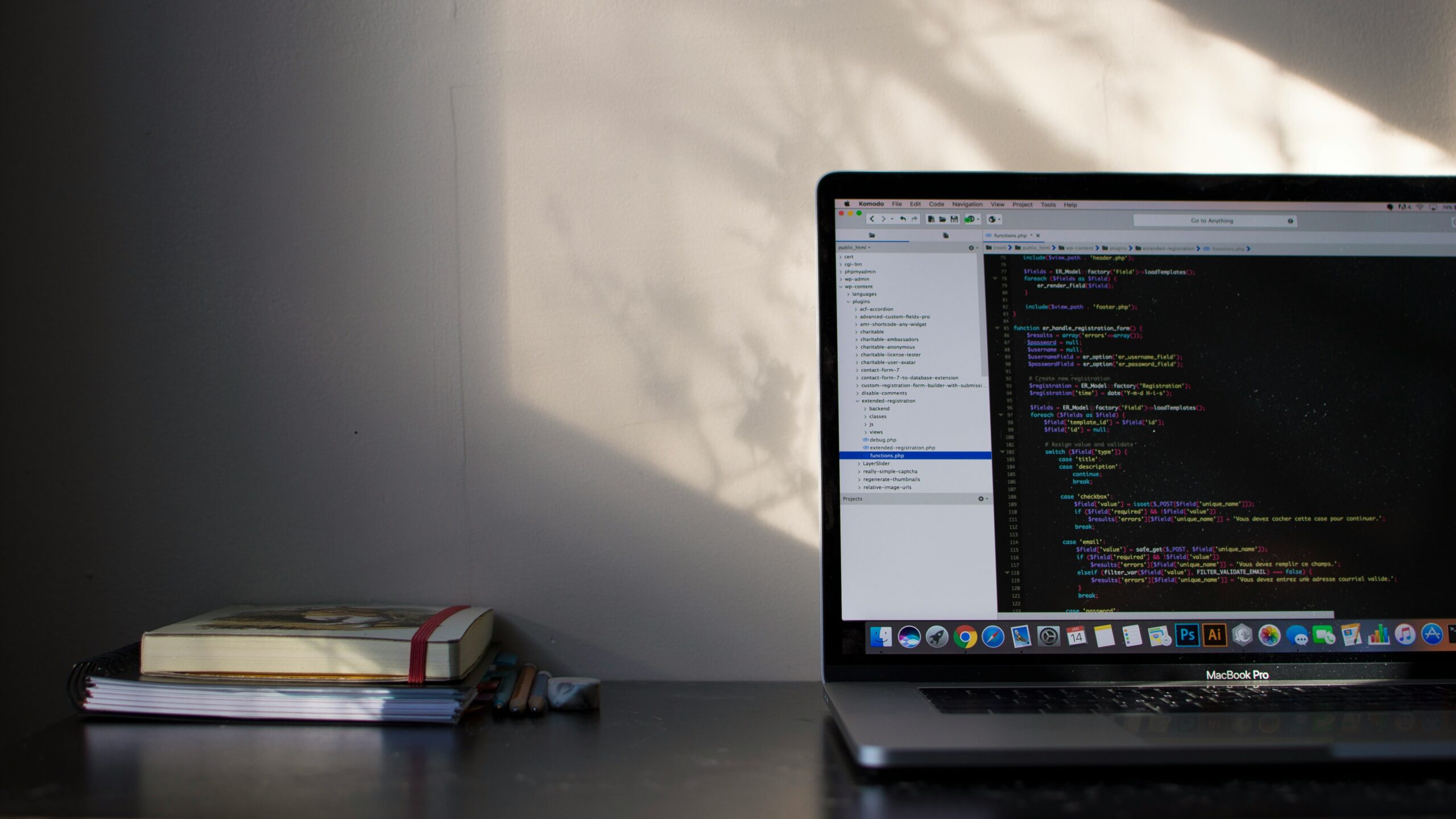Offshore web developer coding on a laptop for a remote offshore website development company