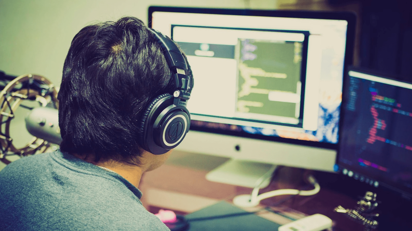 IT professional sitting at a computer, representing specialized tech talent available through IT staffing companies.